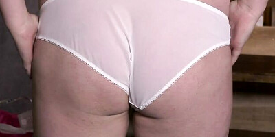 Busty brunette Maya Milano is playing with her massive boobs