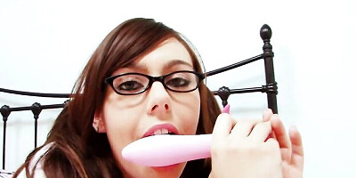 Nerdy young brunette Kacie James is enjoying masturbation