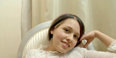 Cute girl Zanna spreads legs and masturbates on the chair