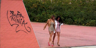 Two pretty Latina girlfriends play with a strap on