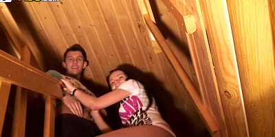 Hot amateurs are having a threesome at a party on the stairs