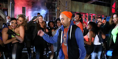 Car loving lesbians kissing passionately on race day