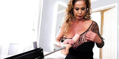 Big-boobed chick Minka is having fun with her massive dildo