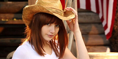 American patriot in a straw hat masturbates outdoors