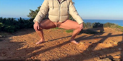 Blonde Girl Walks Pantyless And Barefoot And Pisses On The Path