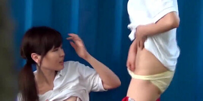 Young Asian stunners rubbing each others snatch in public