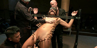 Slave zippered and blindfolded