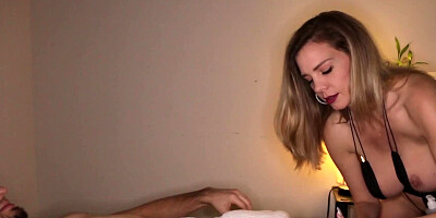 Blonde babe shows her big boobs while stroking a hard cock