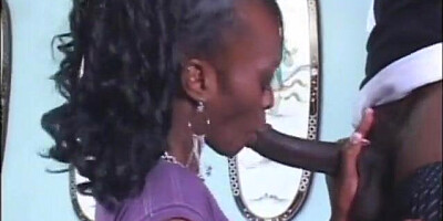 Lusty ebony gives and messy head to mutant black dick