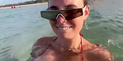 Red Bikini Girl Stuns With A Bold Shoreline Move