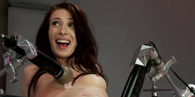 Skinny brunette fucked by machines