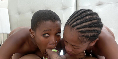 Two black girls on massive white cock