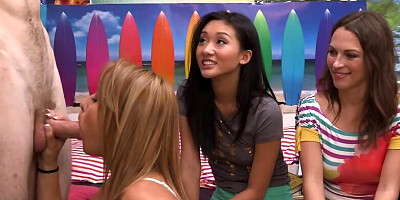 Blonde girl sucks a hard cock in front of her girlfriends