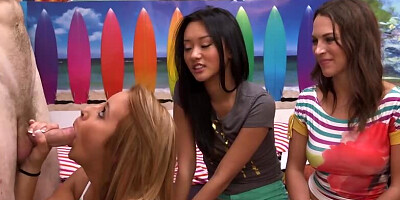 Blonde girl sucks a hard cock in front of her girlfriends