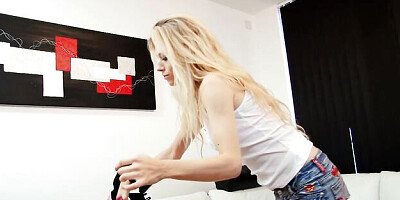 Sweetheart blonde Michelle Moist sticks a toy deep in her shaved pussy