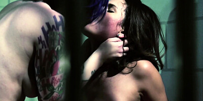 Two lesbians are massaging each other in their small prison cell