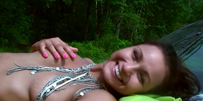 A brunette with natural boobs gets touched and licked by her man