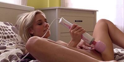 Naked blonde girl plays with her pussy in solo masturbation video