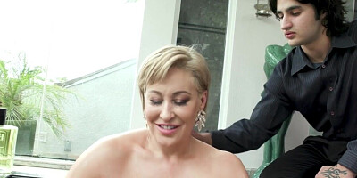 MILF Ryan Keely using her huge boobs to make him cum