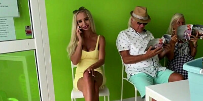 German blonde masturbates at a public laundry