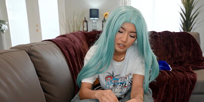 Asian cutie sucks a hard cock and rides it on the couch