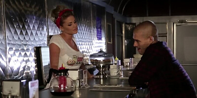 Sad fellow seduced by blonde barmaid with round assets