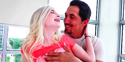 Delicious blonde lady is getting undressed for us