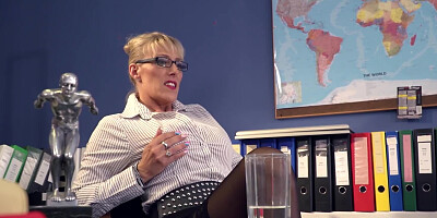 Blonde secretary is sucking a black cock in her office