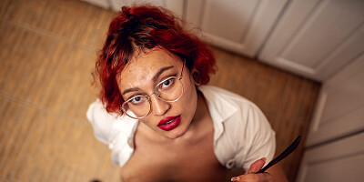 Redhead cougar is fingered and fucked in the kitchen