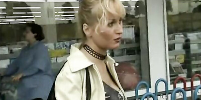 Graceful femme at street scene