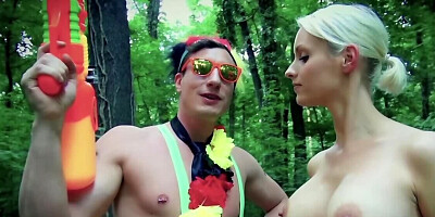 Short-haired blonde girl is sucking some cock in the woods