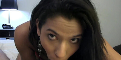 A Latina undresses herself and then she sits on a large cock