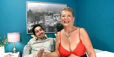 Passionate old lady Joanne Price strokes a young guy's big cock