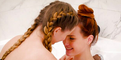 Stella Cardo and Charli Red are enjoying lesbian games in the bathroom