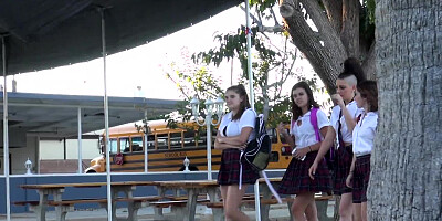 Hot thing in a schoolgirl outfit is giving a sexy show for us