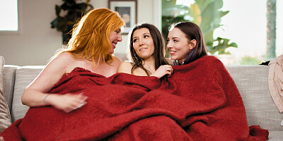 Two chicks and redhead cougar in a lesbian threesome