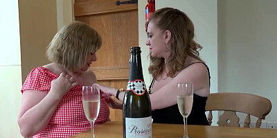 Excited British matures make love in the kitchen