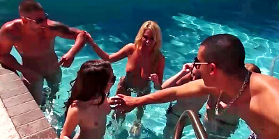 Pretty little gals sucking cocks during some wild pool party