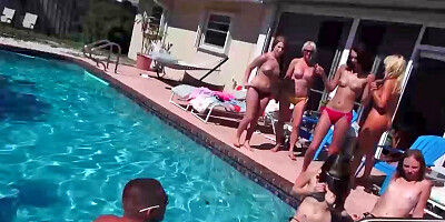 Pretty little gals sucking cocks during some wild pool party