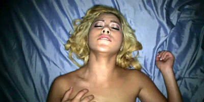 Latina with a sexy body and blonde hair is having sex here