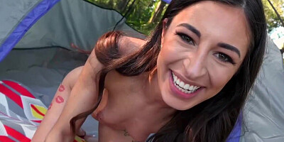 Brunette cutie gives head and rides a cock in the woods