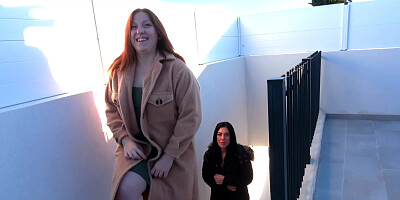 Chubby redhead and her dyke friend working on a dick