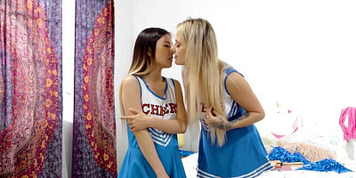 Blonde cheerleader tutors Asian teen in lesbian video