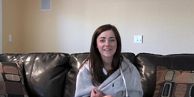 A busty mama removes her outfit and shakes her large tits