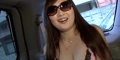 Naughty Asian girl sucks a cock in the car and she swallows