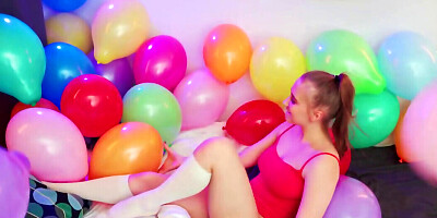 Balloon popping teaser shows her big naturals as well