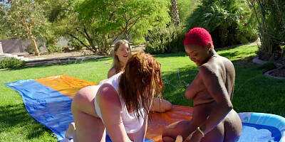 Black and white lesbians fuck each other on the water slide