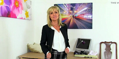 Blonde MILF Ellen from the UK plays with a huge dildo