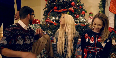 A MILF and a teen working together on a big shaft