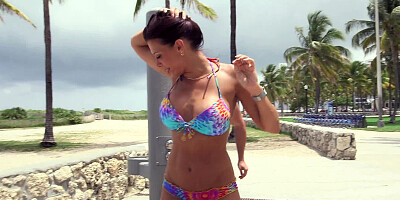 Hot porn star removes her bikini on the beach and has sex there